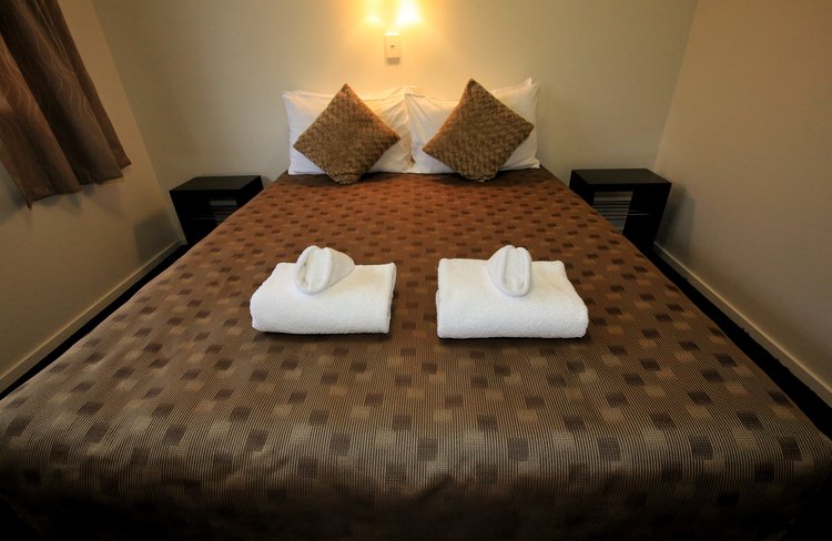 Bedroom of chalets - we have different bedding as below: 1 queen bed plus 2 single beds, 1 queen bed plus 1 king bed, 1 queen bed plus 3 single beds.