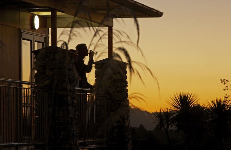 Distinction Hotel Fox Glacier - sunset wine