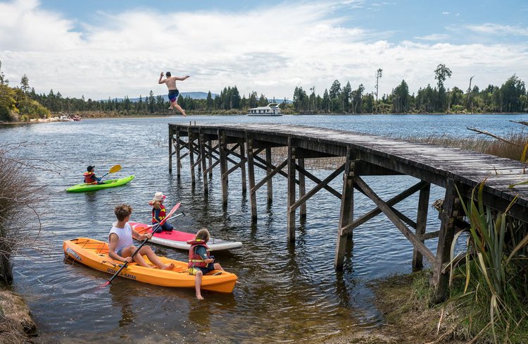 Children playing at Lake Brunner