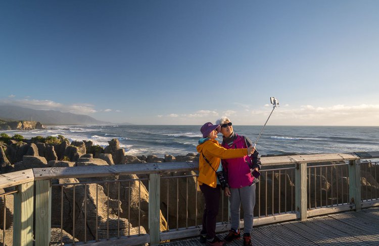 Taking Photos at Punakaiki.JPG