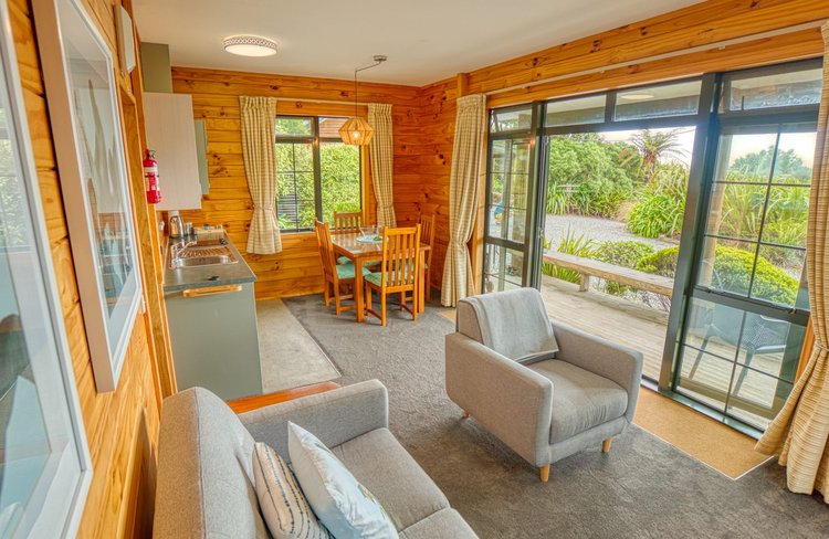 One bedroom open plan living area with sea views