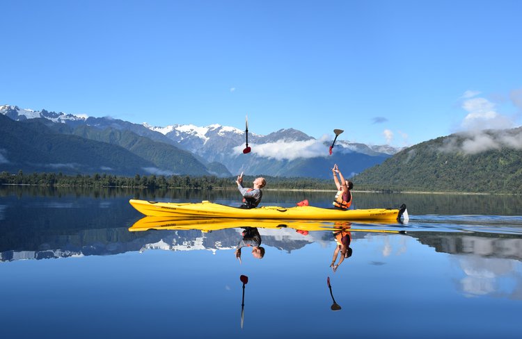Mirror lake magic. Kayak Tours and Rentals on Lake Mapourika - free photos with all tours.