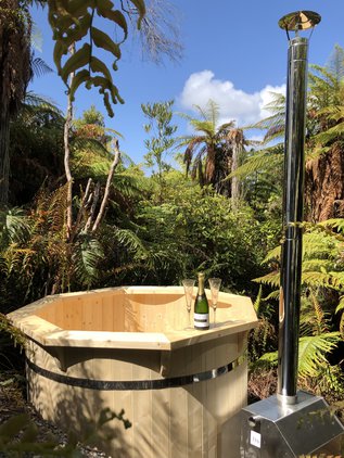 enjoy our complimentary hot tub in a secluded bush setting