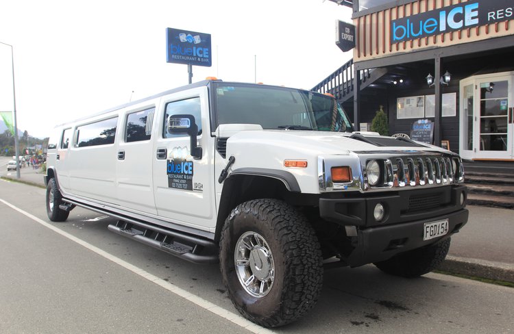 The stretch hummer seating 10-12 people, outside Blue Ice Restaurant.