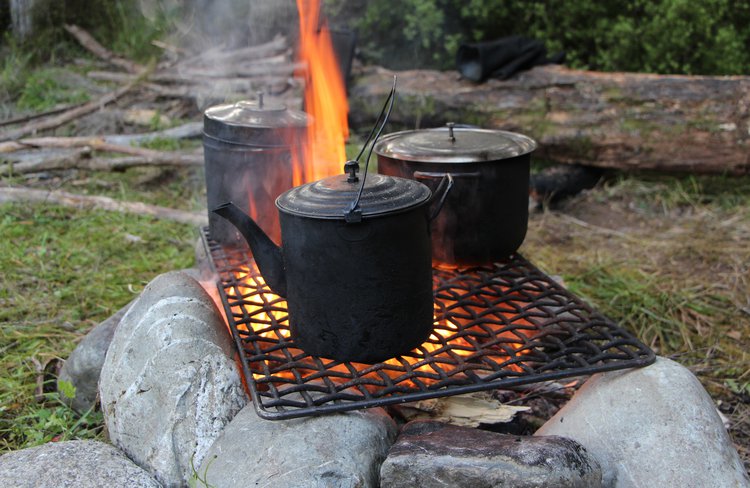 Real camping experience cooking on the open flame.