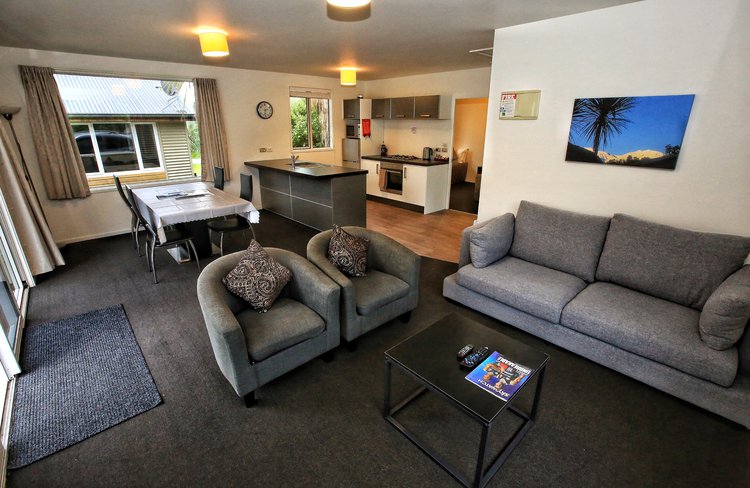 Living area of our one or two bedroom chalet. Large space and full kitchen facilities.