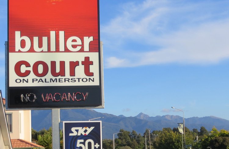 Motel sign, looking South
