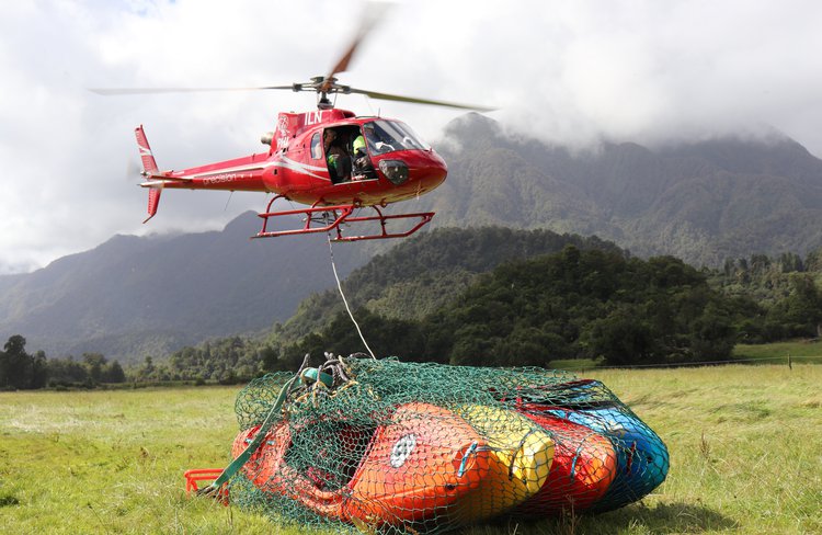 Precision Helicopters Hokitika flying in kayakers.