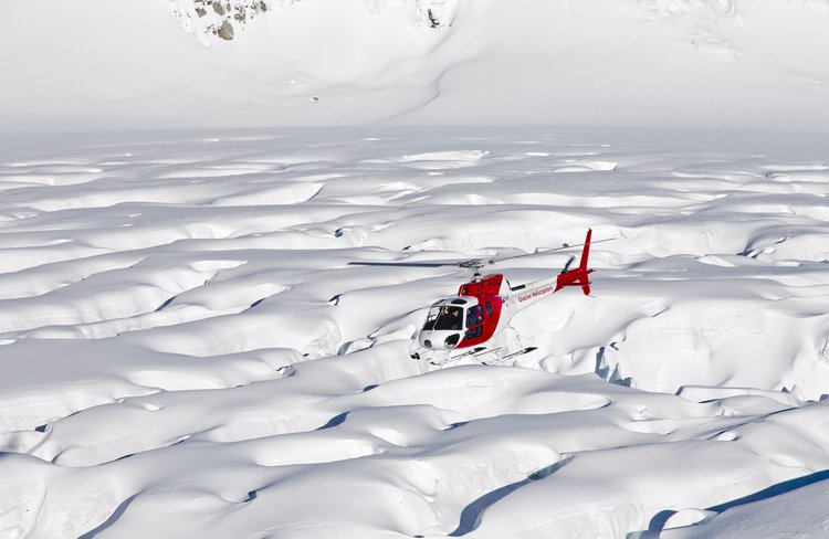 Get up close to the ice formations of the west coast glaciers!