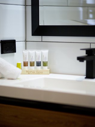 Gorgeous West Coast Koha Spa toiletries in the sparkling, white-tiled bathrooms