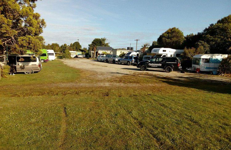 Spacious camp ground with plenty of room for campervans and tents