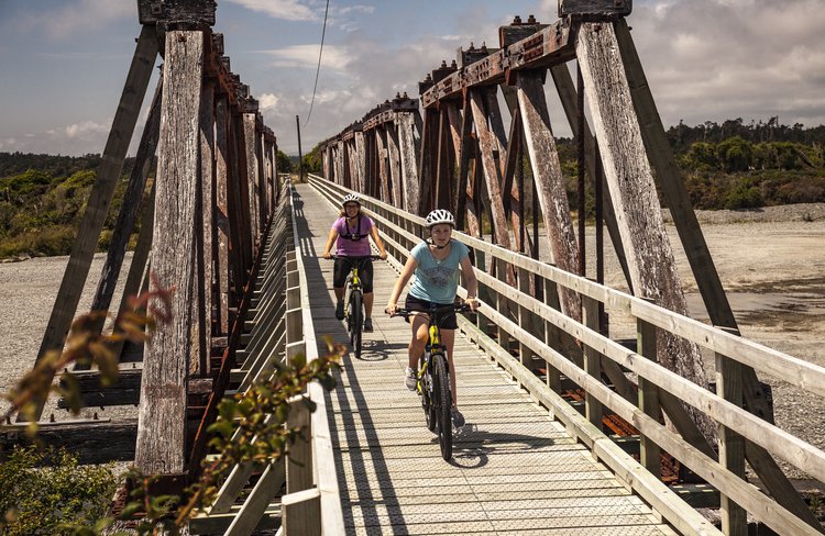 Crossing the Totara River Bridge, West Coast Wilderness Trail.
