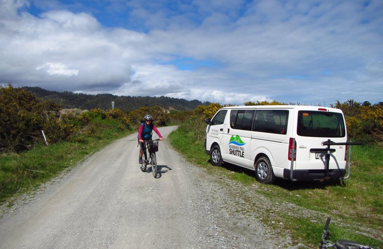 Wilderness Trail Shuttle customer and van